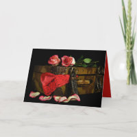 red lingerie and rose on old suitcase anniversary