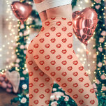 Red Lipstick Kiss Print Peach Leggings<br><div class="desc">Add a playful and romantic vibe to your wardrobe with these red lipstick kiss print leggings set against a charming peach background. These leggings are perfect for Valentine’s Day or whenever you want to make a bold and flirty statement. Comfortable and stylish, the bright red lip prints pop against the...</div>