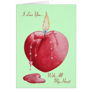 Red love heart shaped candle with romantic verse