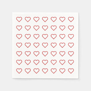 Red love hearts on white napkin