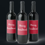 Red Merry Christmas Typography Wine Label<br><div class="desc">Keep it simple with this holiday season with this festive red & white Christmas design. It has the message, “Merry Christmas!” in white Typography / text. If you want to customize the design, you can easily change the message, by using the personalize this text button, or change the colour, by...</div>
