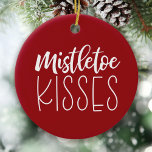 Red Mistletoe Kisses Newlwed Photo Christmas Ceramic Ornament<br><div class="desc">Christmas wishes and mistletoe kisses! That's what Christmas is made of! This adorable red and white ornament is sure to add some holiday cheer! Add a photo and your names to the back of the ornament. Great for newlyweds! Place it on your tree for some extra charm. Designed for you...</div>