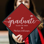 Red Modern Chic Elegant White Script Hearts Graduation Cap Topper<br><div class="desc">Your favourite grad will stand out and make a statement when they wear this graduation cap topper! Let them celebrate their milestone with this girly, stunning, simple, modern, custom graduation keepsake. A fun, playful visual of white script handwriting and cute, playful hearts, along with her name and class year, overlay...</div>