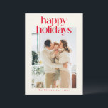 Red Modern Custom Photo Happy Christmas Minimalist Holiday Card<br><div class="desc">Spread holiday cheer with this stylish Happy Holidays card, featuring bold red text on a warm cream background. This minimalist design is both elegant and timeless, perfect for sending seasonal greetings with a modern twist. Personalize with your family name to add a personal touch, making it easy to share festive...</div>