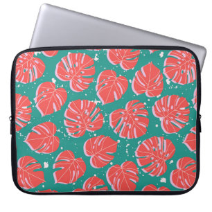 Red monstera leaves on green seamless pattern. Tre Laptop Sleeve