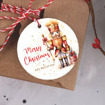 Red Nutcracker Merry Christmas Classic Round Sticker<br><div class="desc">Transform your holiday celebrations with this elegant and modern Red Nutcracker Merry Christmas Classic Round Sticker. Crafted with the utmost attention to detail, these luxurious stickers are the perfect addition to your high-end Christmas party décor. The festive design features the iconic nutcracker motif in a rich red and gold colour...</div>