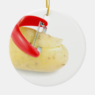 Red Peeler Slicing Potato On White Background Ceramic Ornament