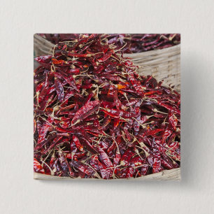 Red peppers at local produce market 2 inch square button
