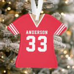 Red Personalized Football Jersey Ornament<br><div class="desc">Capture the spirit of the game with this personalized red football jersey ornament. Perfect for any football fan, this unique ornament features your custom name and number on a classic jersey design. Made from durable materials, it's a festive way to showcase your team spirit and add a personal touch to...</div>