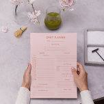 Red Pink Daily Planner & Tracker Notepad<br><div class="desc">Organize your day with this red and pink daily planner notepad. Track tasks,  water intake,  meals,  exercise,  gratitude,  and finances all in one place.</div>