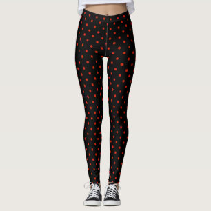 Red polka dot pattern on black leggings
