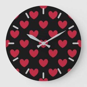 Red polka hearts on black large clock