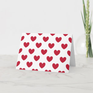 Red polka hearts on white holiday card