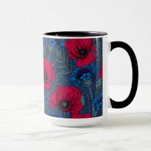 Red poppies and blue cornflowers on blue mug