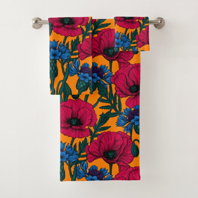 Red poppies and blue cornflowers on orange bath towel set (Insitu)