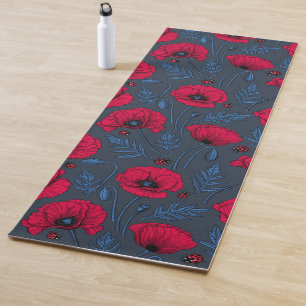 Red poppies and ladybugs on dark blue blue yoga mat