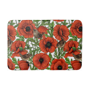 Red poppies and wrens, green leaves on white bath mat