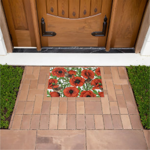 Red poppies and wrens, green leaves on white doormat