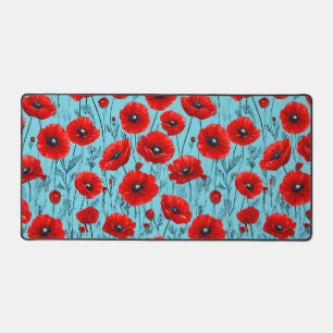 Red poppies flowers on a blue background desk mat