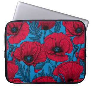 Red poppy garden on blue laptop sleeve