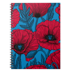 Red poppy garden on blue notebook