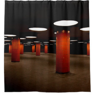 RED POST UNDER CEILING LIGHT AT NIGHT