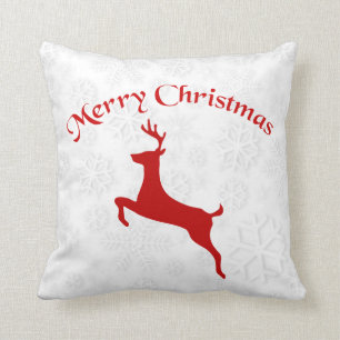 Red Reindeer Over Snowflakes Background Throw Pillow