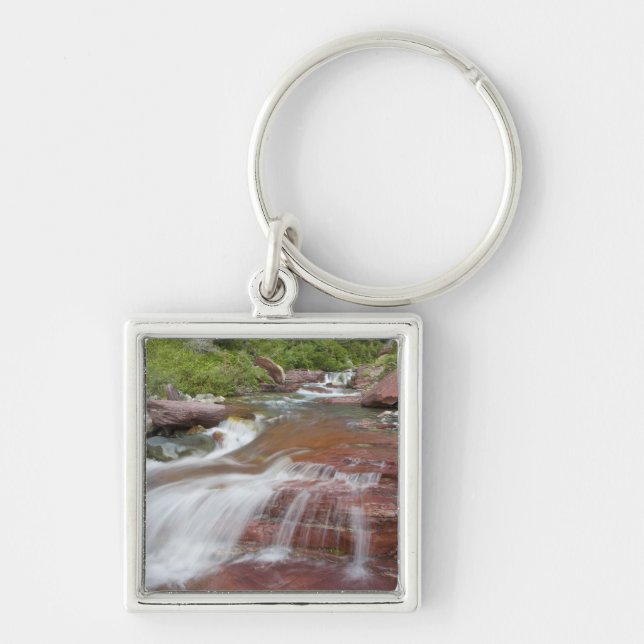 Red rock in Baring Creek in Glacier National Keychain (Front)