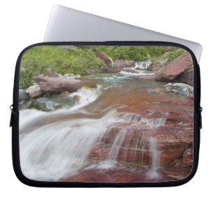 Red rock in Baring Creek in Glacier National Laptop Sleeve