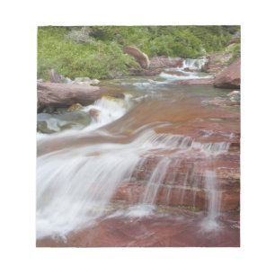 Red rock in Baring Creek in Glacier National Notepad