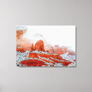 red rocks in snow wrapped canvas
