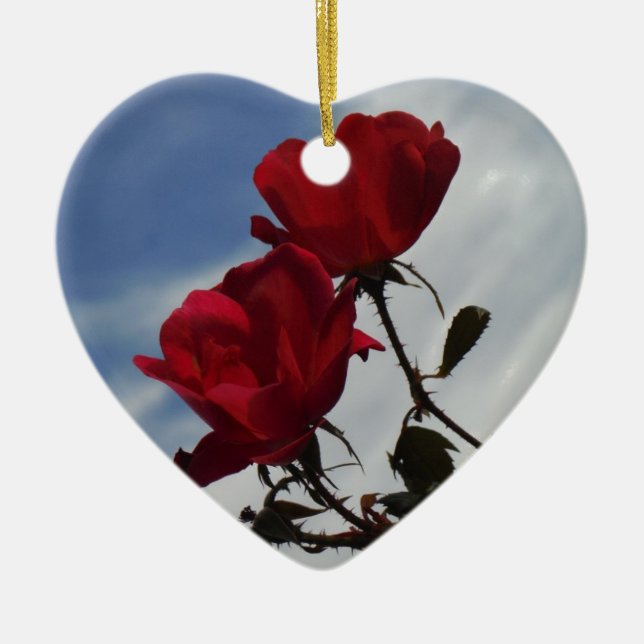 Red Roses Against a Bright Blue Sky Ceramic Ornament (Front)