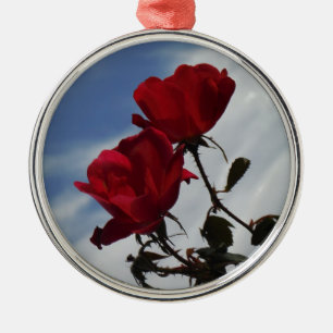 Red Roses Against a Bright Blue Sky Metal Ornament