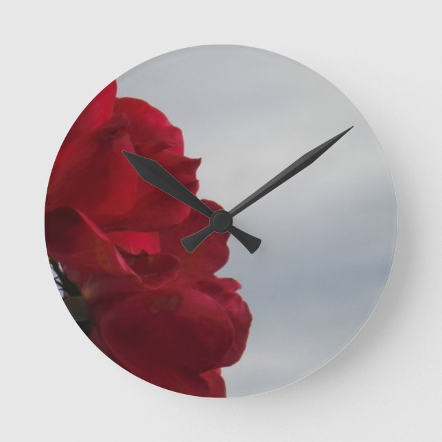Red Roses Against a Bright Blue Sky Round Clock (Front)