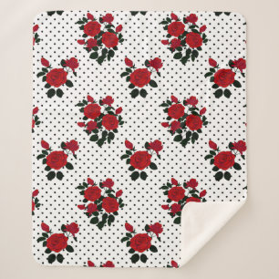 Red roses on a polka dot background. sherpa blanket