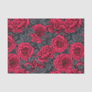 Red roses with gray leaves on black tissue paper