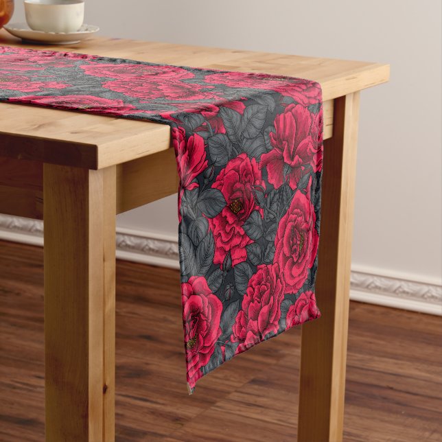 Red roses with grey leaves on black short table runner (In Situ)