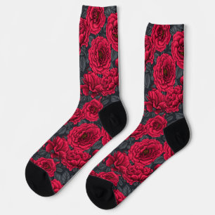 Red roses with grey leaves on black socks