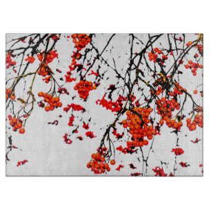 Red rowan fruits or ash berries cutting board