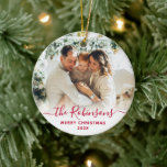 Red Script Family Name Photo Merry Christmas   Ceramic Ornament<br><div class="desc">Elegant Modern Red Hand Lettered Script "Family Name" Merry Christmas Photo Ornament. Features a family photo,  "family name" calligraphy text in handwritten script,  with Merry Christmas text and year photo overlay (white). Easy to personalize it. Photo tip: crop your photo to square form before upload it.</div>
