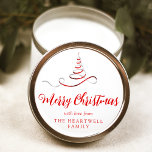 Red Silver Ribbon Tree Merry Christmas Script Classic Round Sticker<br><div class="desc">This modern holiday sticker features a red and silver faux foil ribbon Christmas tree sprinkled with silver faux glitter,  and the words "Merry Christmas" in stylish red calligraphy script. Personalize it with your family's name in serif font.</div>