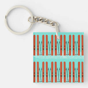 Red skis on blue keychain