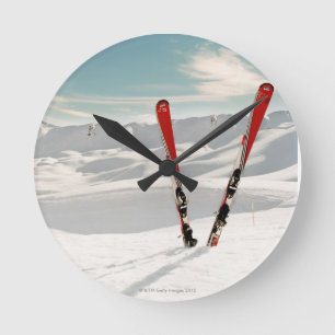 Red Skis Round Clock