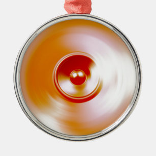 Red spinning music speaker metal ornament