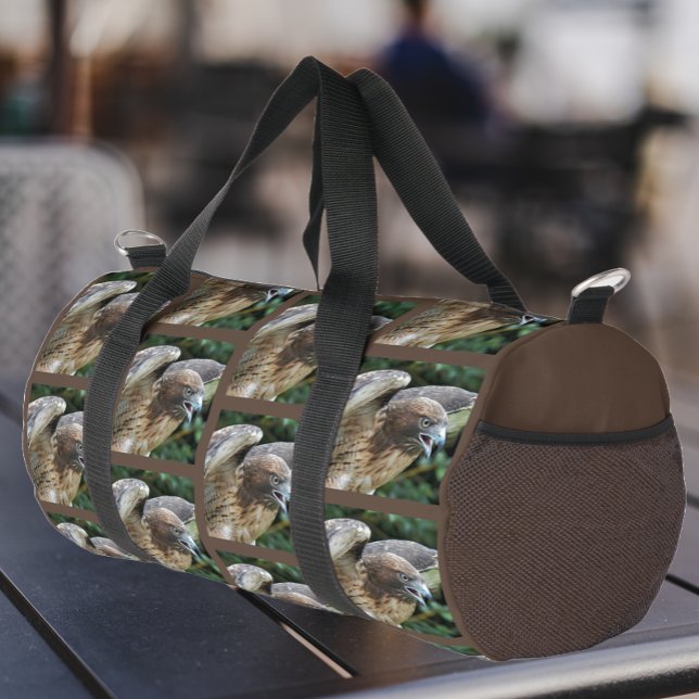 Red-tailed Hawk Pattern on Brown Duffle Bag (In Situ)