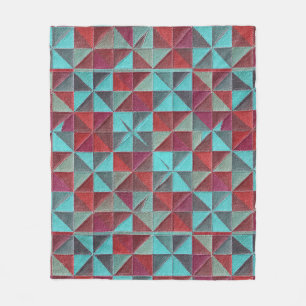 red, teal, purple, and gray quilt fleece blanket