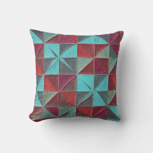 red, teal, purple, and gray quilt throw pillow