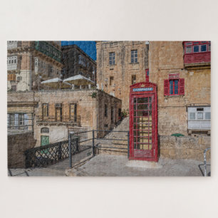 Red telephone booth in Valletta Malta Jigsaw Puzzle