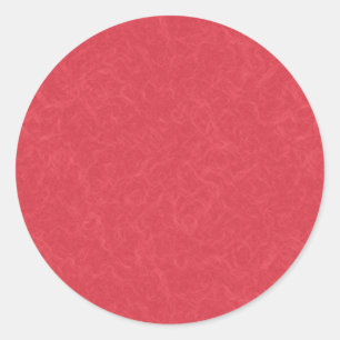 Red textured surface with subtle swirling pattern classic round sticker