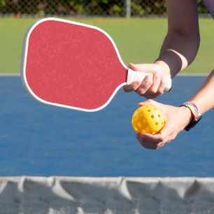 Red textured surface with subtle swirling pattern pickleball paddle